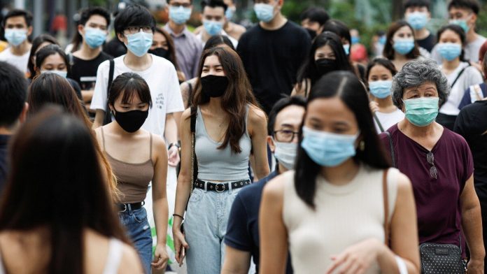 Singapore Responds to COVID Surge with Mask Mandate, Advisory